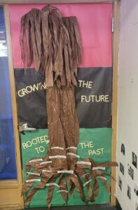 Macomb Montessori Academy students decorate their classroom door in honor of black history month.