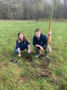 WMAES Students plant a tree together in the 62-acre campus in celebration of earth day at their school.